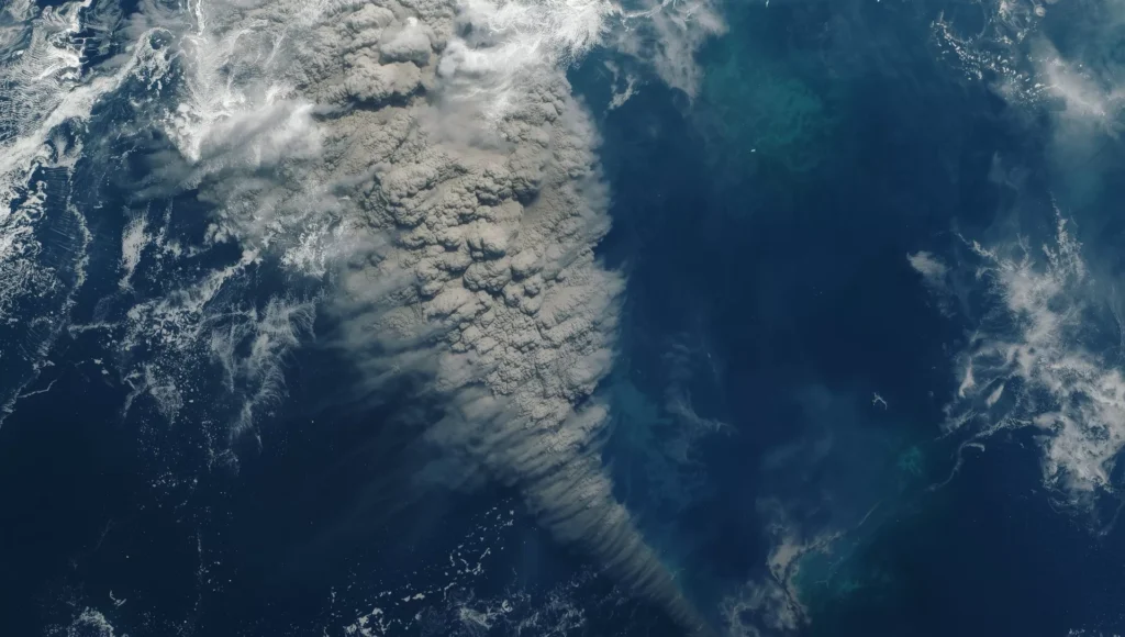 
 Satellite image of the 2022 Hunga Tonga underwater volcano eruption spreading ash over the Pacific.