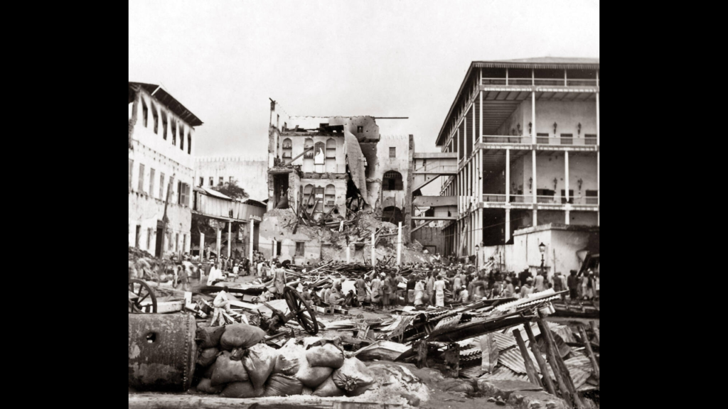 Black-and-white photo of the Sultan’s palace in Zanzibar showing heavy structural damage and rubble